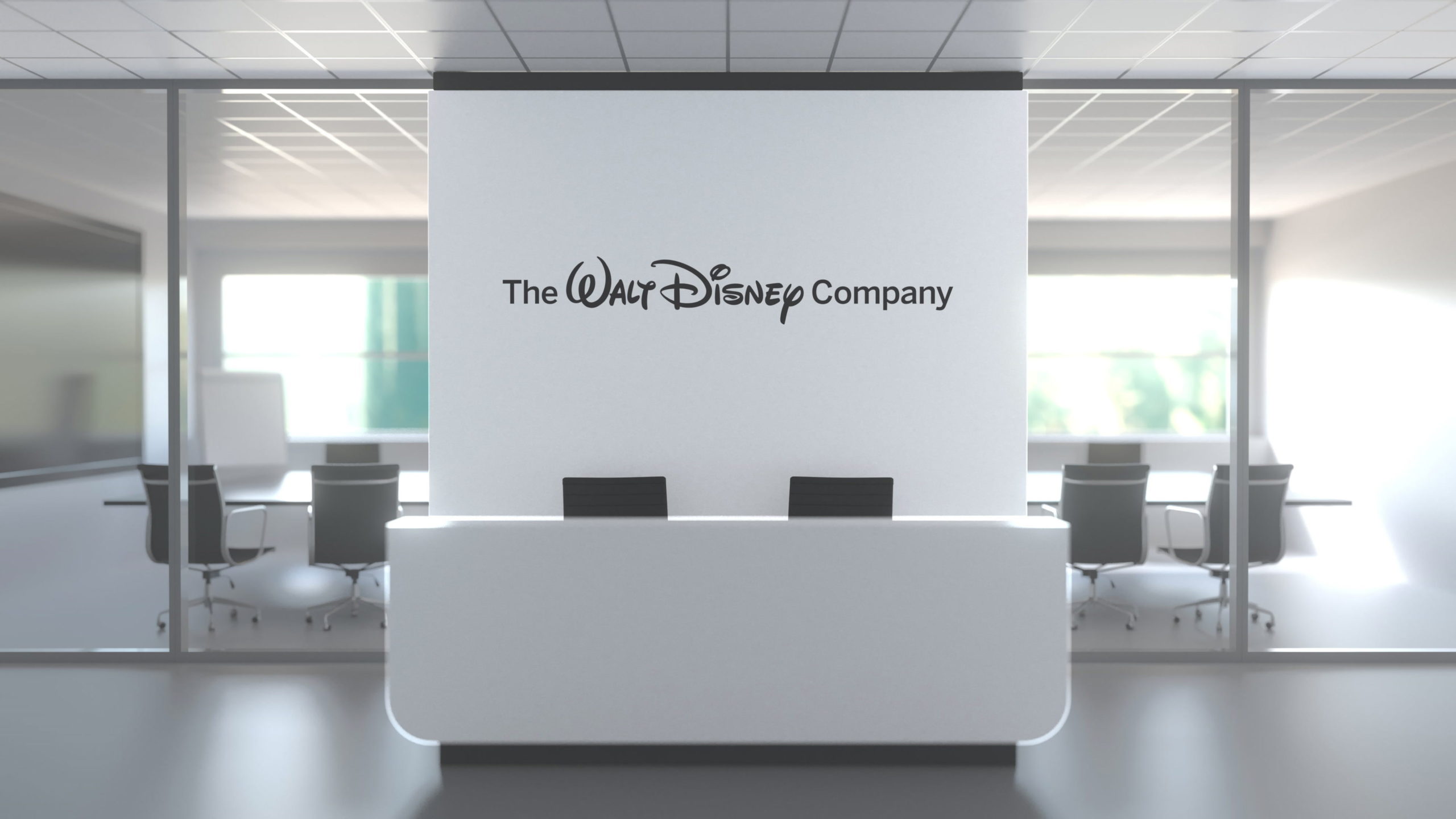 Logo of THE WALT DISNEY COMPANY on a wall in the modern office ...